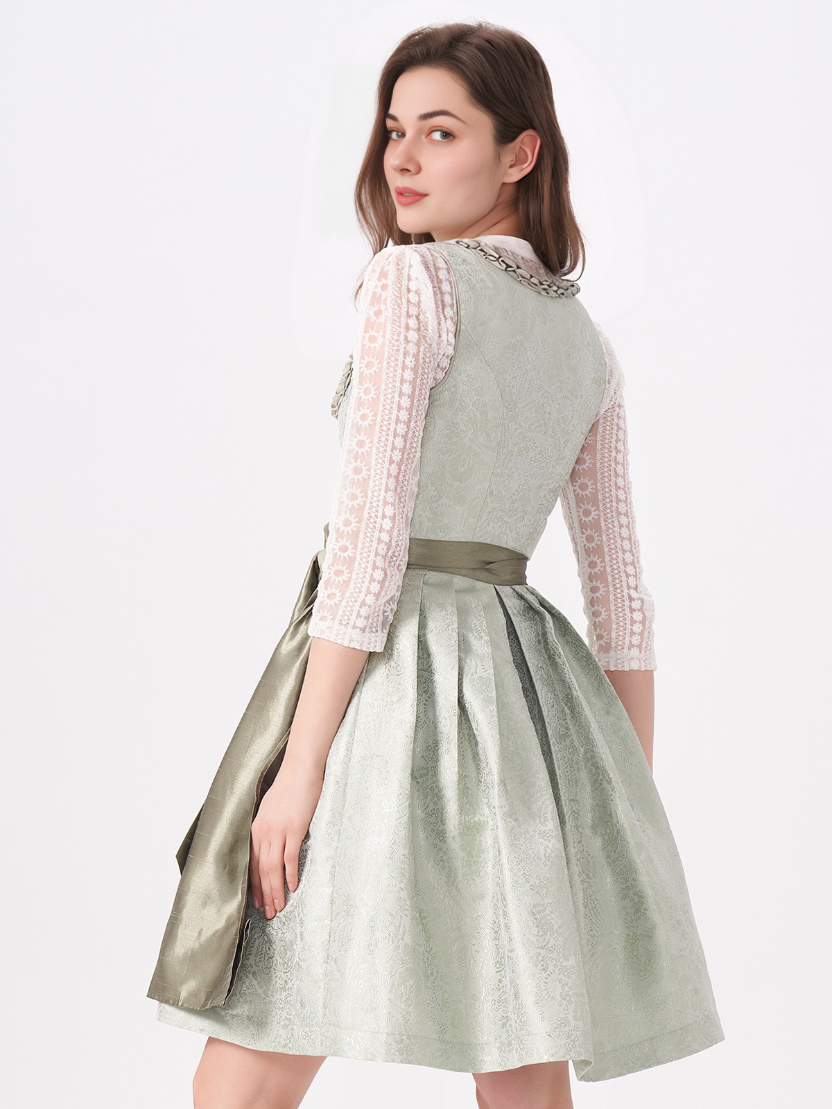 Grünes Dirndl mit floralen Details