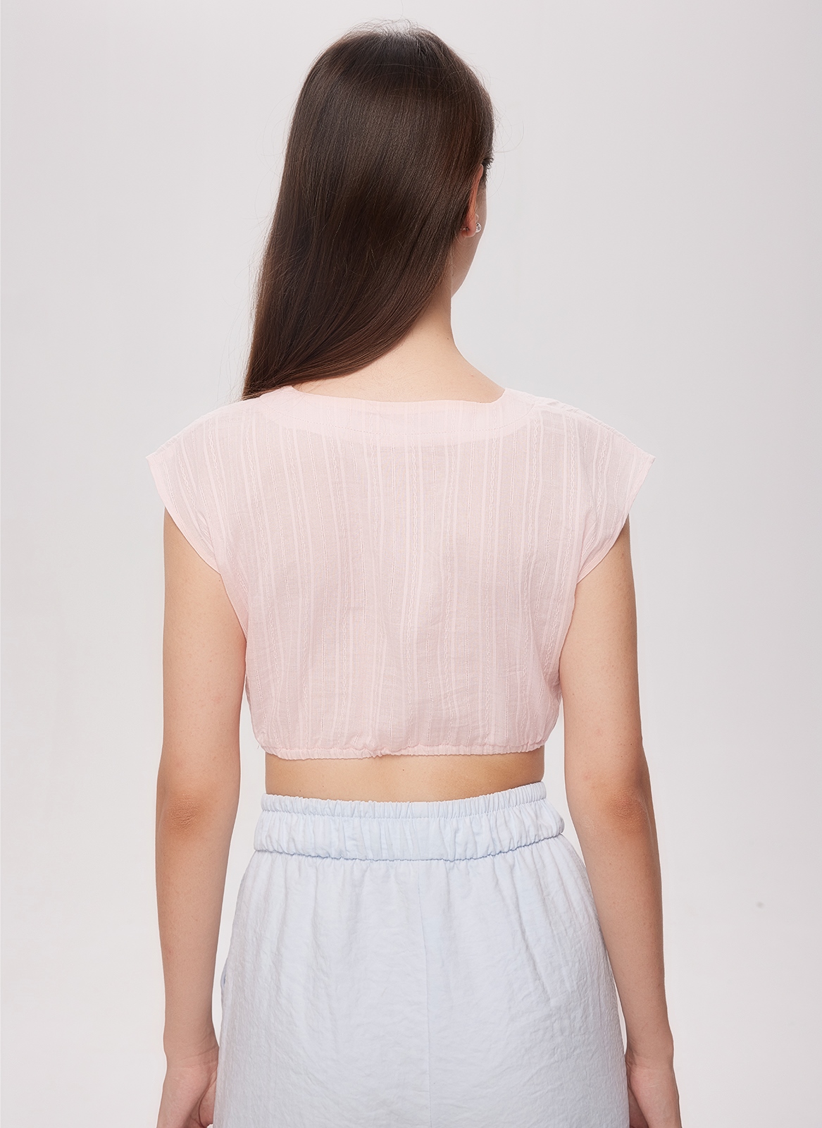 Hochgeschlossene Dirndlbluse in Rosa mit Spitzenbesatz